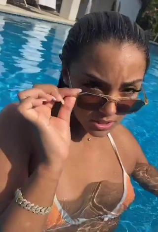 Sultry Wejdene in Peach Bikini at the Swimming Pool