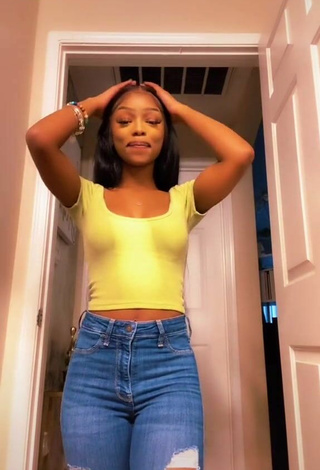 2. Luscious Shania Christian Shows Cleavage in Crop Top