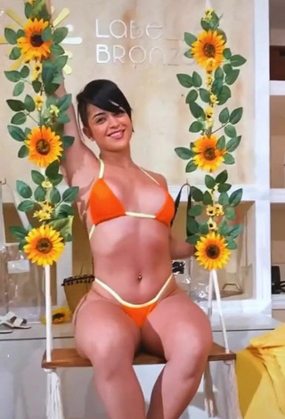 5. Luscious Yanne in Orange Bikini