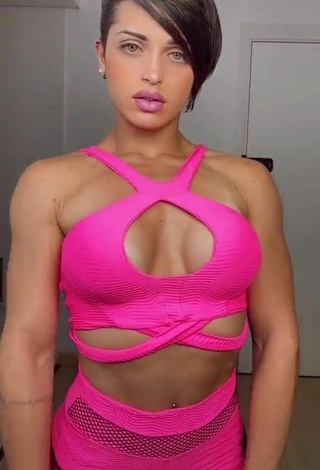 5. Sultry Yanne Shows Cleavage in Firefly Rose Crop Top