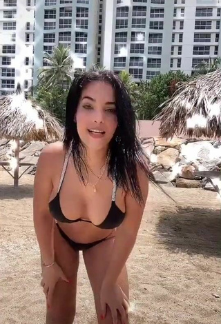 Luscious Yeimmy Shows Cleavage in Black Bikini at the Beach