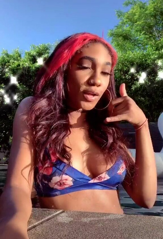 2. Luscious Bria Alana Shows Cleavage in Floral Bikini Top at the Pool