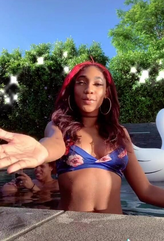 5. Luscious Bria Alana Shows Cleavage in Floral Bikini Top at the Pool