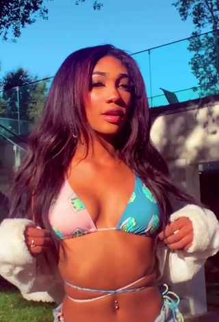 Sultry Bria Alana Shows Cleavage in Bikini Top