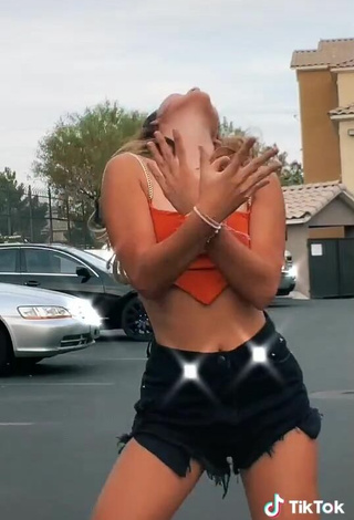 5. Titillating Bryana Pastor in Orange Crop Top and Bouncing Boobs