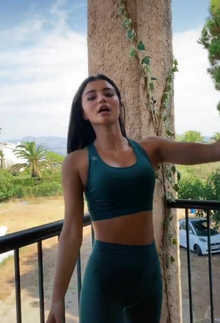 Sultry Cassandra Cano in Turquoise Leggings on the Balcony