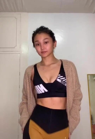 Sultry Chienna Filomeno Shows Cleavage in Crop Top