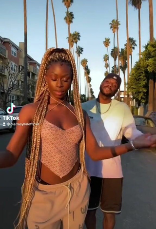 Luscious Diarra Sylla Shows Cleavage in Crop Top in a Street