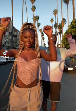 2. Luscious Diarra Sylla Shows Cleavage in Crop Top in a Street