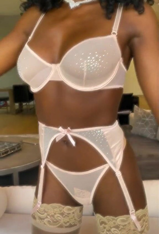 5. Titillating FashionNova Shows Cleavage in White Lingerie