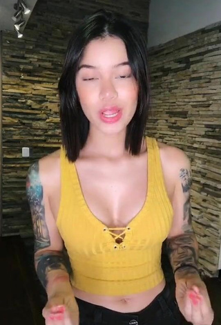 Beautiful Jenn Muriel Shows Cleavage in Sexy Crop Top