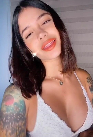 2. Sexy Jenn Muriel Shows Cleavage in White Top