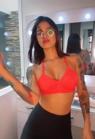 5. Beautiful Jenn Muriel Shows Cleavage in Sexy Orange Sport Bra