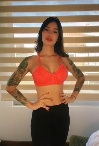 2. Sweetie Jenn Muriel Shows Cleavage in Orange Sport Bra and Bouncing Breasts