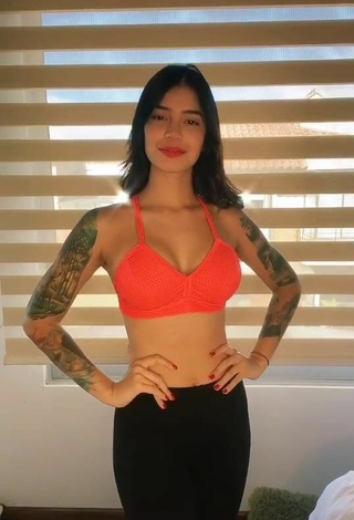 3. Sweetie Jenn Muriel Shows Cleavage in Orange Sport Bra and Bouncing Breasts