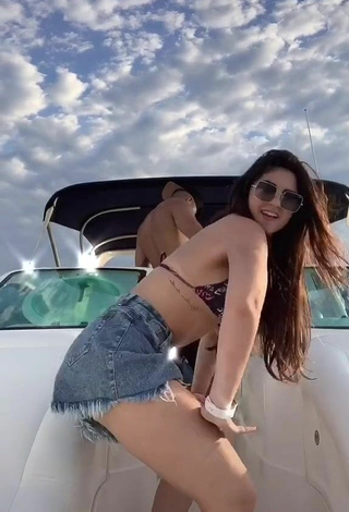 5. Sexy Le Azevedo in Bikini Top on a Boat