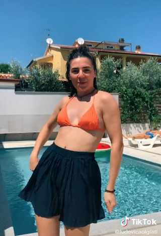 3. Sultry Ludovica Olgiati in Orange Bikini Top at the Swimming Pool