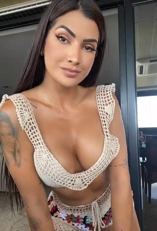 Luscious Marina Ferrari Shows Cleavage in Beige Bikini Top