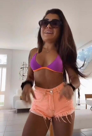 Cute Marina Ferrari Shows Cleavage in Violet Bikini Top