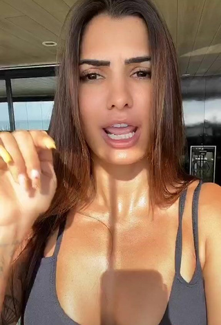 5. Sultry Marina Ferrari Shows Cleavage in Black Sport Bra