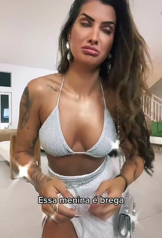 Seductive Marina Ferrari Shows Cleavage in Silver Bikini Top