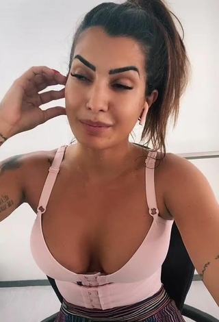 Sexy Marina Ferrari Shows Cleavage in Pink Crop Top