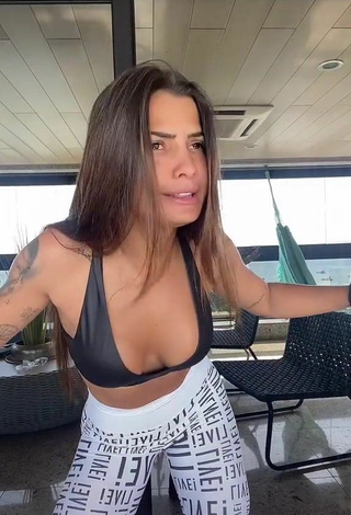 4. Sexy Marina Ferrari Shows Cleavage in Black Sport Bra