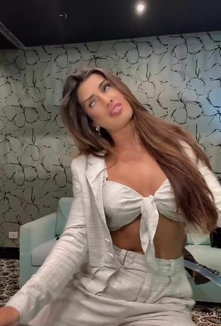 2. Hot Marina Ferrari Shows Cleavage in White Crop Top