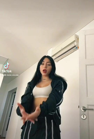 Sultry Nicki Nicole Shows Cleavage in White Crop Top