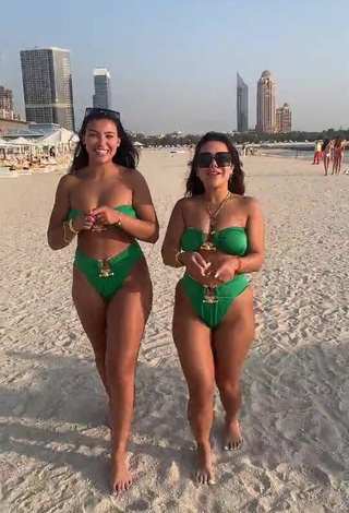 3. Sultry Nourhène Shows Cleavage in Green Bikini at the Beach