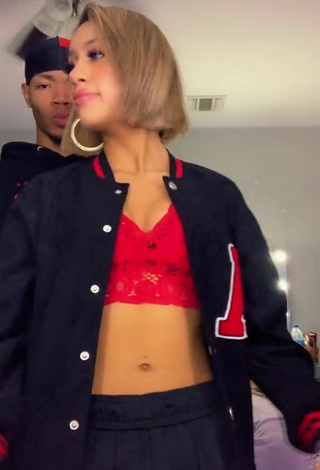 4. Sultry Paradiisedd in Red Crop Top