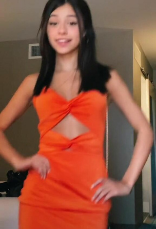 3. Luscious Rachel Brockman in Orange Dress