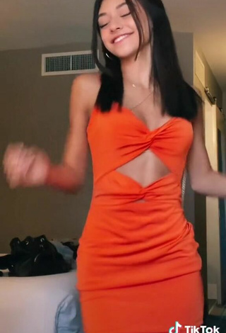 5. Luscious Rachel Brockman in Orange Dress