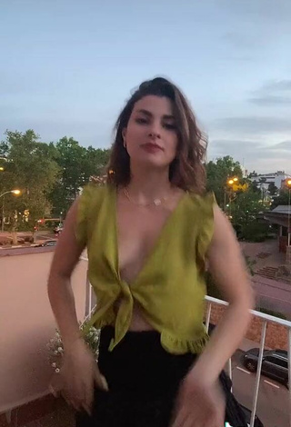 5. Titillating Agustina Palma in Green Crop Top on the Balcony