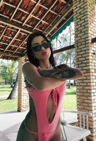 Luscious Amanda Ferreira Shows Cleavage in Pink Swimsuit