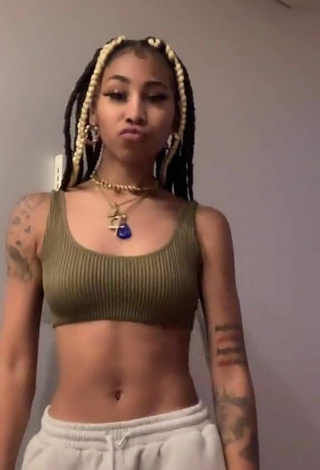 3. Sultry Ariana Taylor in Olive Crop Top