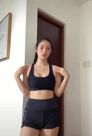 4. Sultry Barbie Imperial Shows Cleavage in Black Sport Bra