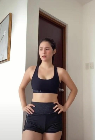 6. Sultry Barbie Imperial Shows Cleavage in Black Sport Bra