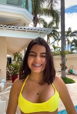 3. Sultry Bela Almada Shows Cleavage in Yellow Bikini Top and Bouncing Boobs