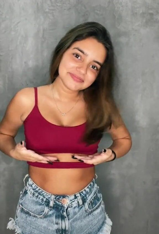 5. Titillating Bela Almada in Red Crop Top and Bouncing Boobs