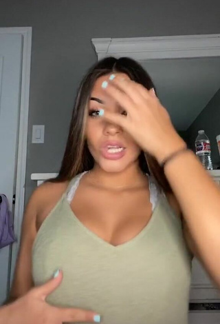 Sultry Camryn Cordova Shows Cleavage in Olive Top