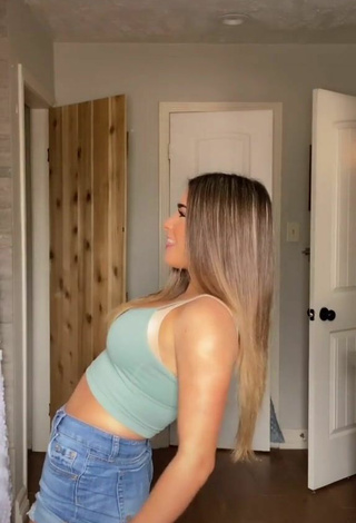 5. Titillating Camryn Cordova in Olive Crop Top