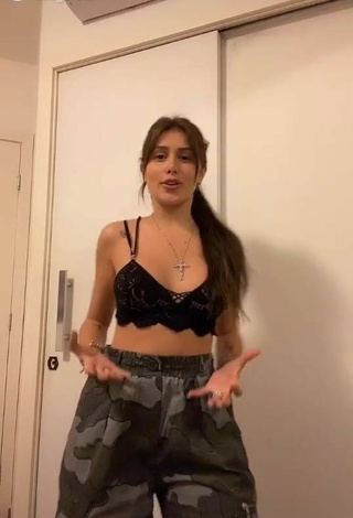 2. Sexy Ca Garcia Shows Cleavage in Black Crop Top