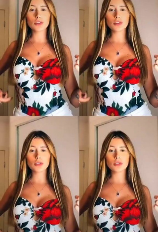 Luscious Ca Garcia Shows Cleavage in Floral Top