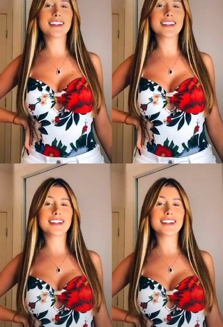 2. Luscious Ca Garcia Shows Cleavage in Floral Top