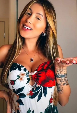 5. Luscious Ca Garcia Shows Cleavage in Floral Top