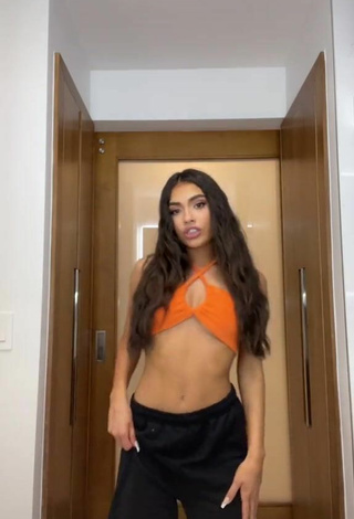 2. Sultry Dancedomela Dance crew in Orange Bikini Top