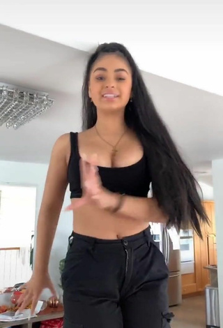 2. Devenity Perkins Shows Cleavage in Cute Black Crop Top and Bouncing Boobs