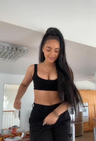 3. Devenity Perkins Shows Cleavage in Cute Black Crop Top and Bouncing Boobs