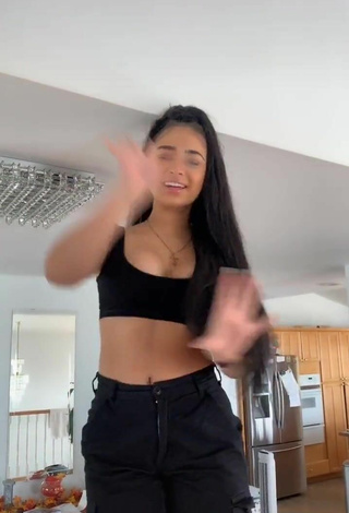 4. Devenity Perkins Shows Cleavage in Cute Black Crop Top and Bouncing Boobs